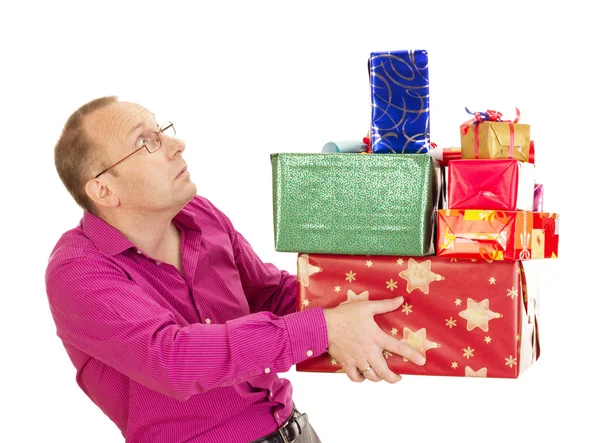 Business person with a lot of gifts — Stock Photo, Image