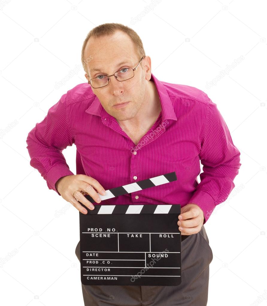 A male business person with a clapperboard