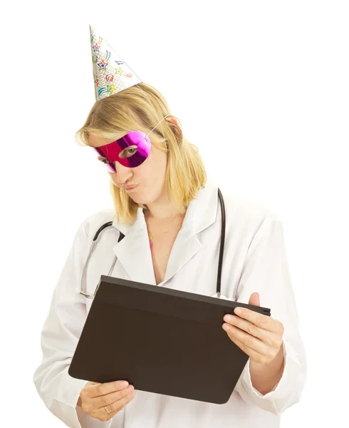A female medical doctor with a clapperboard — Stock Photo, Image