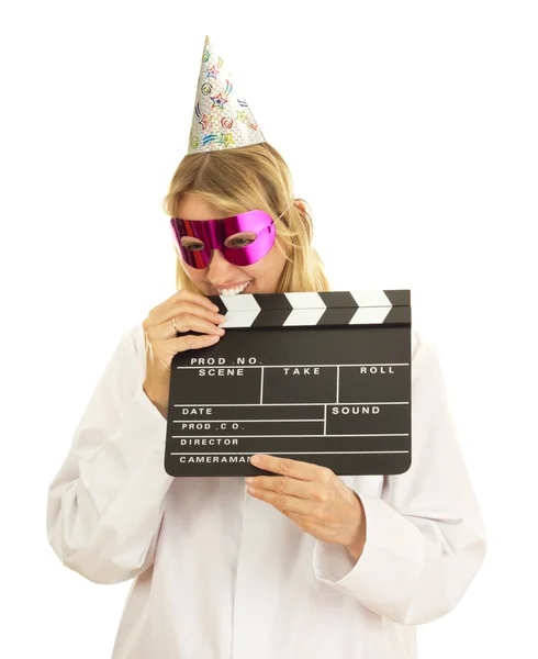 A female medical doctor with a clapperboard — Stock Photo, Image