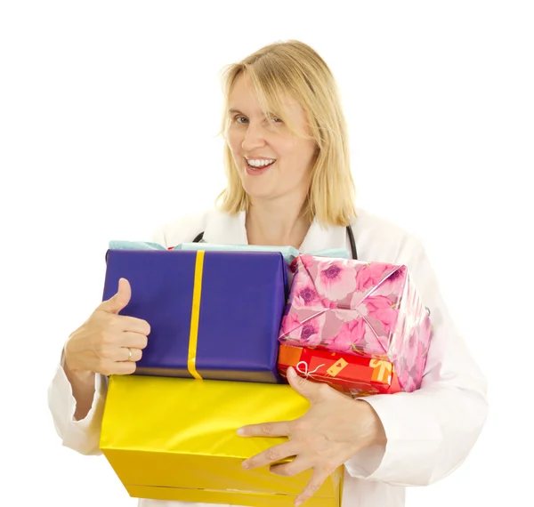 Medical doctor with some gifts — Stock Photo, Image