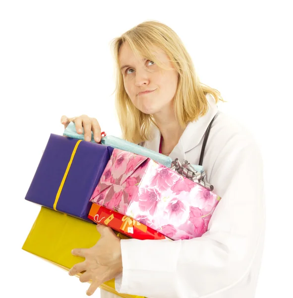 Medical doctor with some gifts — Stock Photo, Image