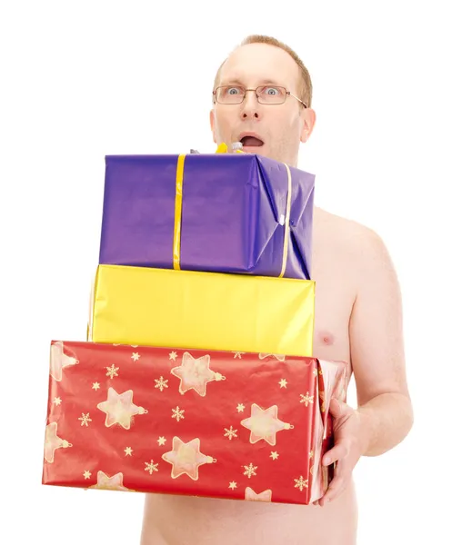 Homem nu com alguns presentes — Fotografia de Stock