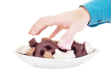 bazı hassas gingerbreads yiyen kişi