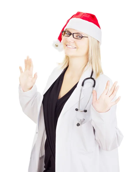Noel Baba şapkası ile tıp doktoru — Stok fotoğraf