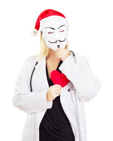 Medico con un ragazzo fawkes maschera — Foto Stock