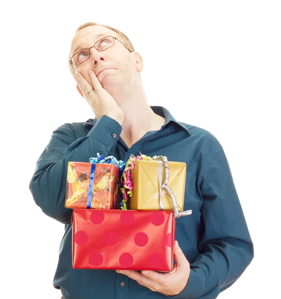 Business person with some colorful gifts — Stock Photo, Image