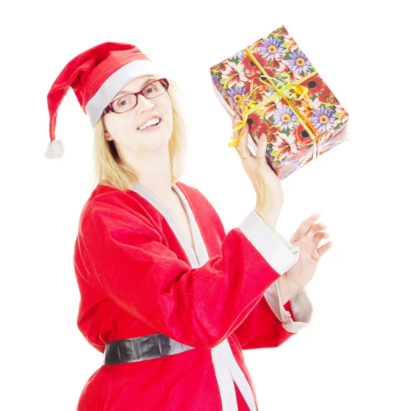 Santa claus throwing gift — Stock Photo, Image