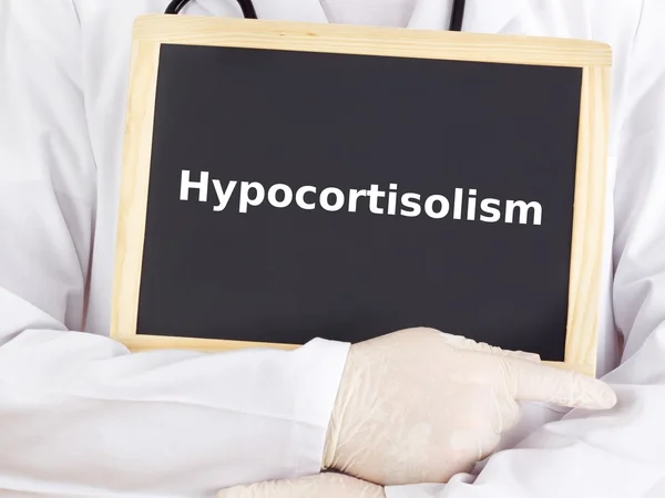 Doctor shows information on blackboard: hypocortisolism — Stock Photo, Image