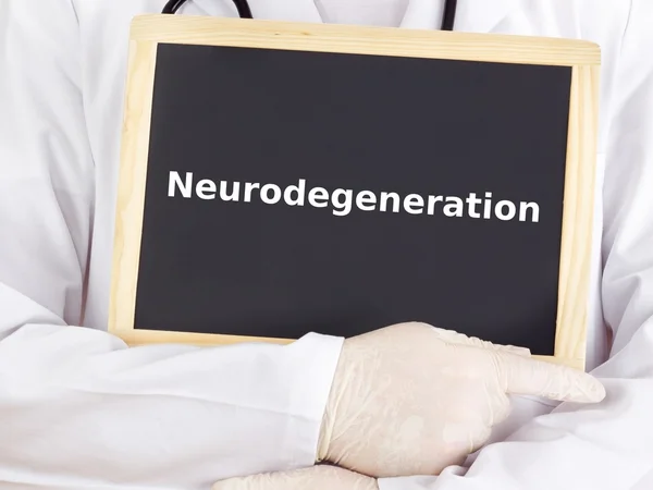 Doctor shows information: neurodegeneration — Stock Photo, Image