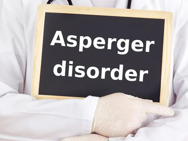 Doctor shows information: asperger disorder — Stock Photo, Image