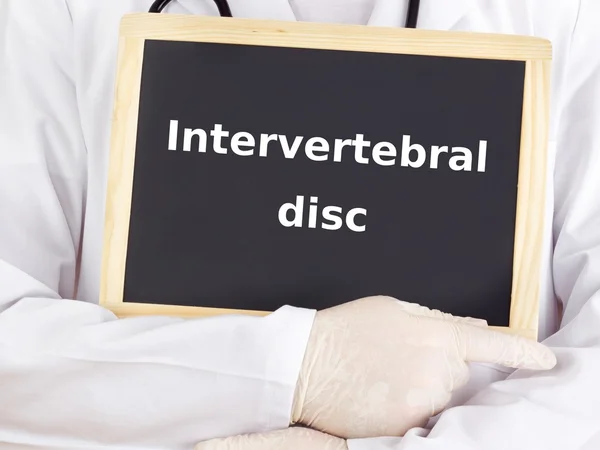 Doctor shows information: intervertebral disc — Stock Photo, Image