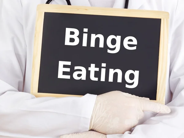 Arzt zeigt Informationen: Binge Eating — Stockfoto