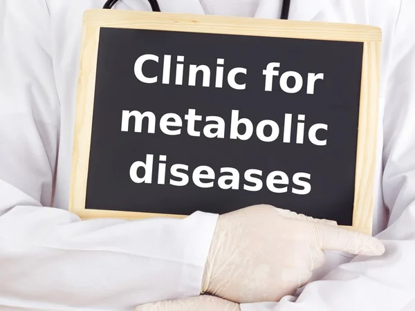 Doctor shows information: clinic for metabolic diseases — Stock Photo, Image