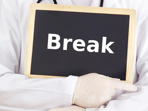 Doctor shows information on blackboard: break — Stock Photo, Image