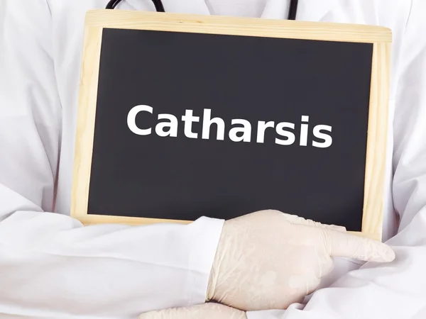 Doctor shows information on blackboard: catharsis — Stock Photo, Image