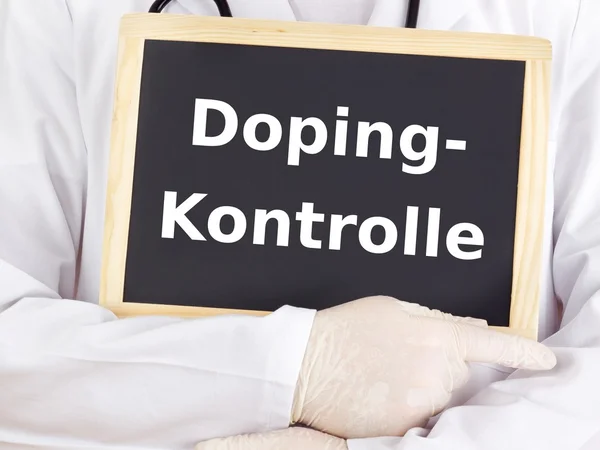 Doctor shows information on blackboard: doping test — Stock Photo, Image