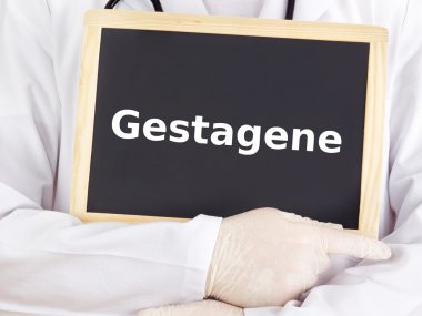 Doktor tahtaya bilgileri gösterir: progestogen