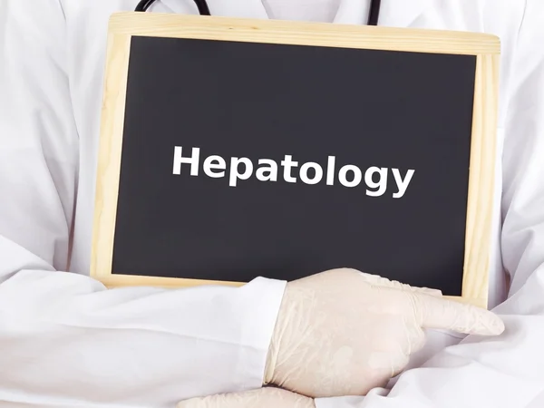 Doctor shows information on blackboard: hepatology — Stock Photo, Image