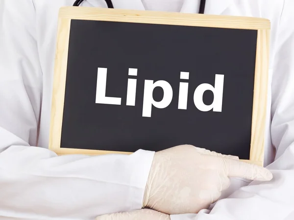 Doctor shows information on blackboard: lipid — Stock Photo, Image