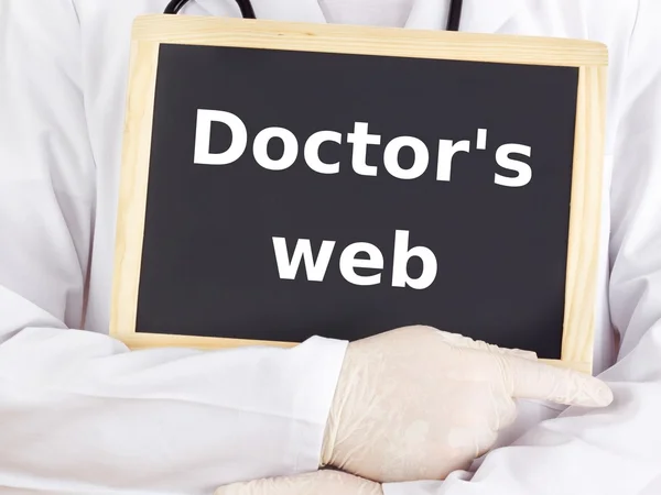 Doctor shows information on blackboard: doctor's web — Stock Photo, Image