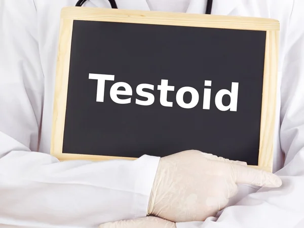 Arzt zeigt Informationen auf Tafel: Testoide — Stockfoto