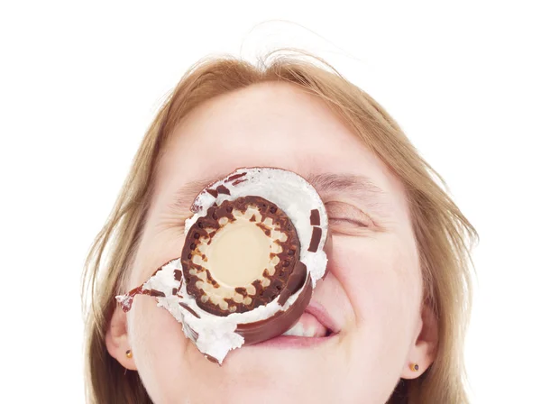 Woman with chocolate marshmallow in the face — Stock Photo, Image