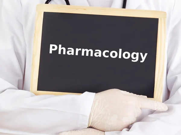 Doctor shows information: pharmacology — Stock Photo, Image