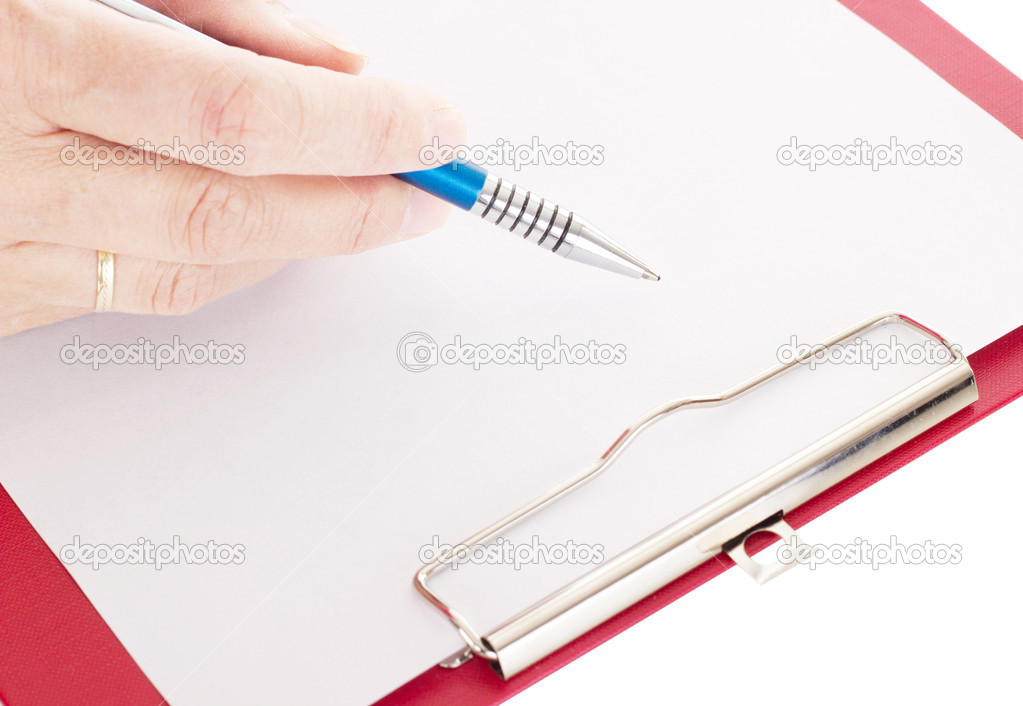 Hand with pen on clipboard