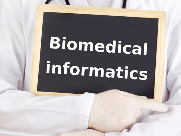 Doctor shows information: biomedical informatics — Stock Photo, Image