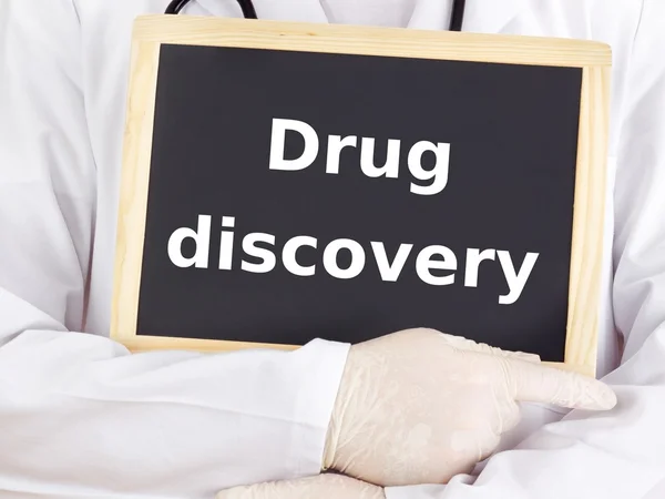 Doctor shows information: drug discovery — Stock Photo, Image
