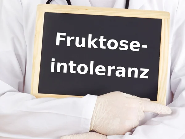 Doctor shows information: fructose intolerance — Stock Photo, Image