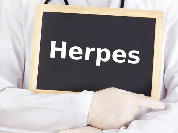 Doctor shows information: herpes simplex — Stock Photo, Image