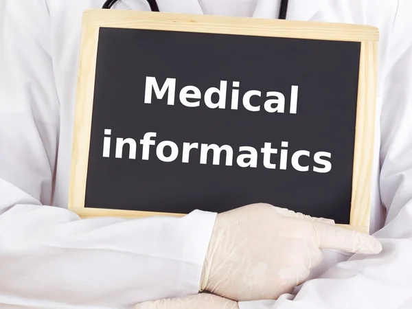 Doctor shows information: medical informatics — Stock Photo, Image