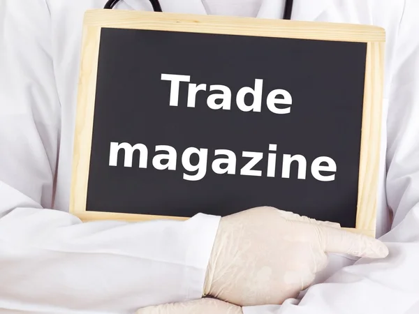 Doctor shows information: trade magazine — Stock Photo, Image