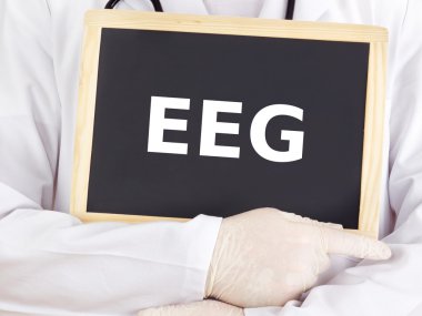 Doctor shows information on blackboard: EEG clipart