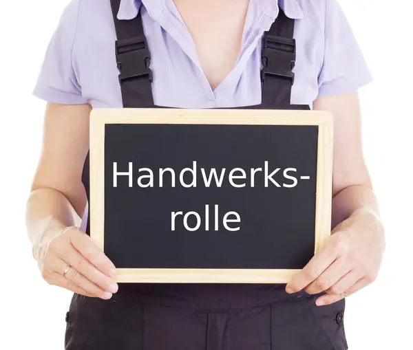 Craftsperson with blackboard: official register of handicrafts — Stock Photo, Image