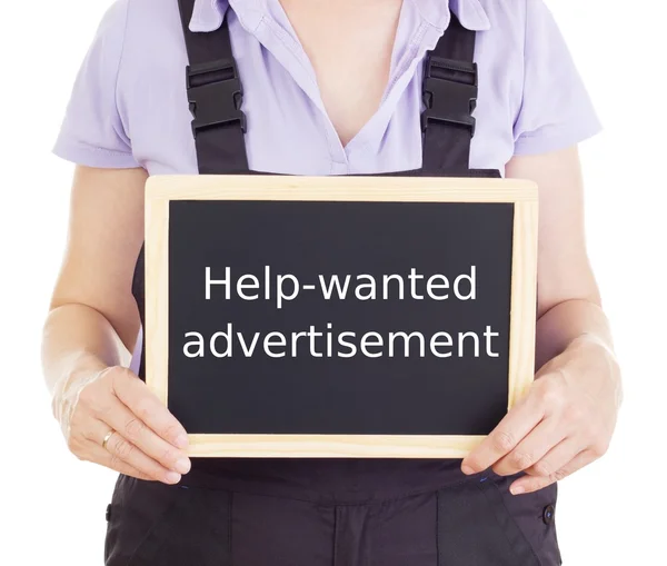 Craftsperson with blackboard: help-wanted advertisement — Stock Photo, Image