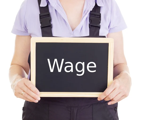 Craftsperson with blackboard: wage — Stock Photo, Image