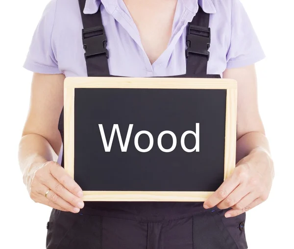 Handwerker mit Tafel: Holz — Stockfoto