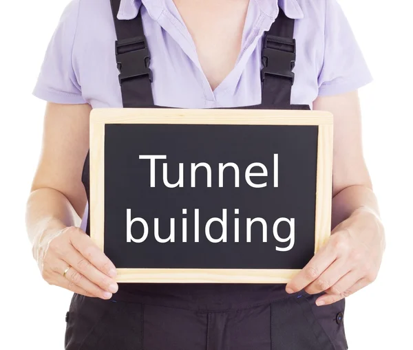 Craftsperson with blackboard: tunnel building — Stock Photo, Image