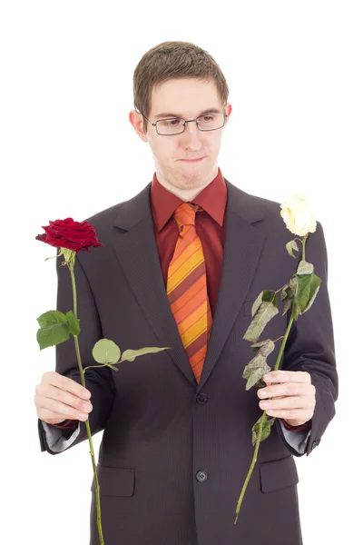 Junger Mann mit Rosen — Stockfoto
