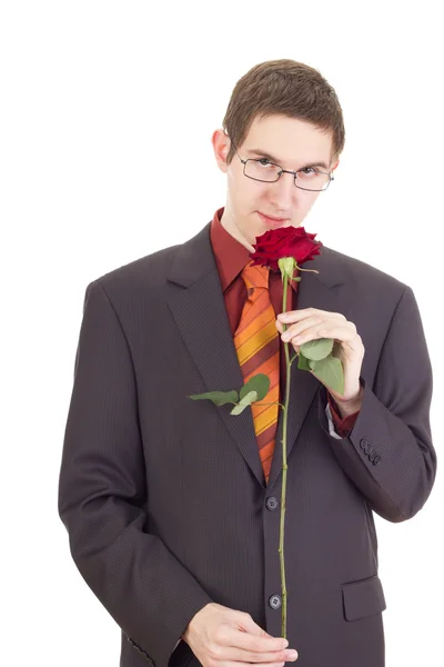 Young man with a rose — Stock Photo, Image