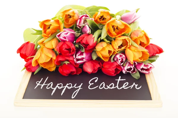 Tulpenstrauß mit Tafel: Frohe Ostern — Stockfoto