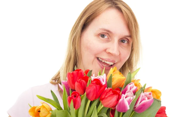 Женщина с тюльпанами — стоковое фото
