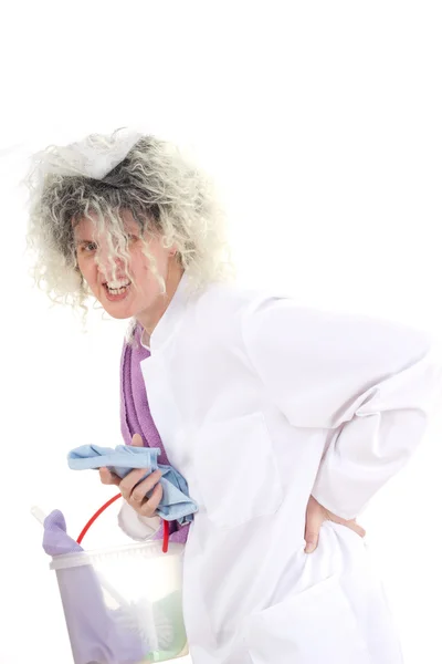 Female cleaner in white work coat having backache — Stock Photo, Image