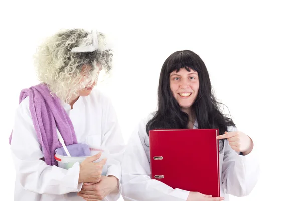 Female cleaners in white work coats — Stock Photo, Image