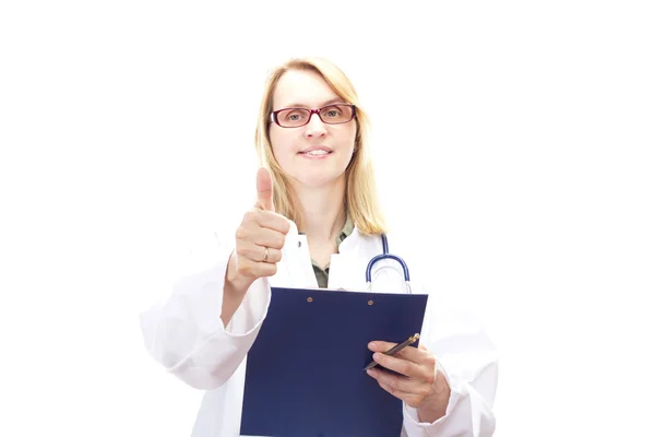 Médica feminina com área de transferência mostrando o polegar para cima — Fotografia de Stock