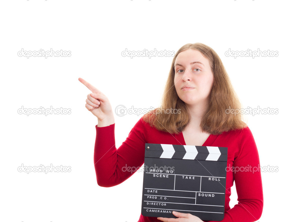 Woman with clapperboard pointing at something