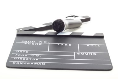 Clapperboard and microphone on white background clipart